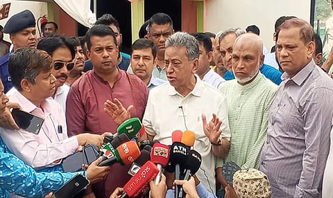 Finance and Planning Minister Amir Khasru Mahmud Chowdhury distributes relief among flood victims in Chattogram