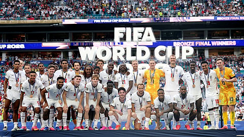 England players pose on the podium during the medal ceremony after winning the Bronze Final