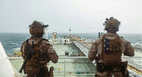 Military forces are deployed near the Strait of Hormuz as the United States and Iran exchange fresh attacks.
