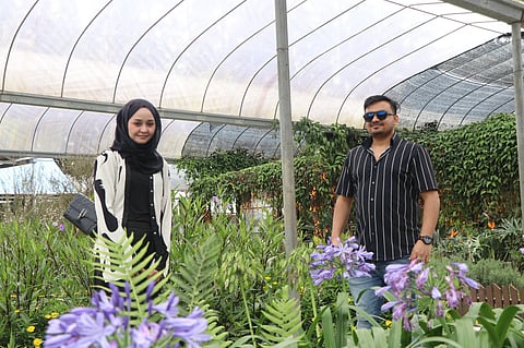 Founder Md Farhad Hossain (L) with Nor Shafiqah Binti Roslan, a Malaysian alumna of Universiti Malaya, who serves as Chief Financial Officer.