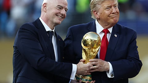 US President Donald Trump and FIFA President Gianni Infantino with the World Cup trophy during the trophy presentation