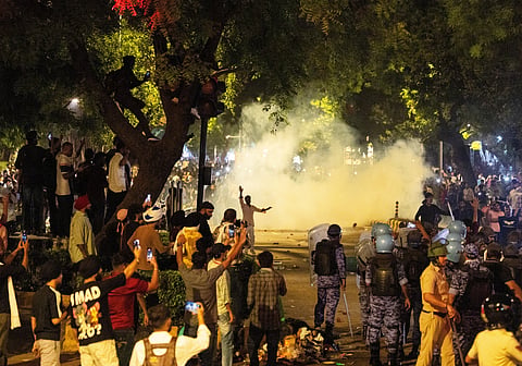 Police fire tear gas during the ongoing protest of Cockroach Janata Party (CJP) demanding the resignation of Education Minister Dharmendra Pradhan over examination paper leaks, at Jantar Mantar in New Delhi, India, July 22, 2026.