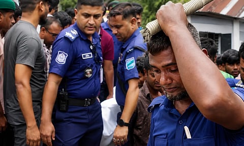 Constable Shamsul is seen grieving his son's death