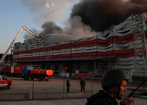 Firefighters work at the site of a Russian missile strike, amid Russia's attack on Ukraine, in Kyiv region, Ukraine July 19, 2026.