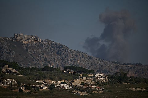 Smoke rises to the sky in an area near Beaufort Castle following an Israeli military strike in southern Lebanon as seen from northern Israel, Friday, June 19, 2026. 