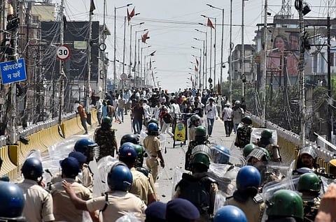 Protesters engage in a clash with policemen during Bihar Bandh call for demanding the resignation of Education Minister Dharmendra Pradhan over National Eligibility cum Entrance Test (NEET) examination paper leaks, in Patna, India, July 25, 2026.