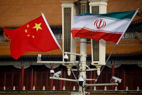 The national flags of China and Iran fly in Tiananmen Square, China, February 14, 2023