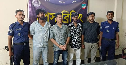 Police escort alleged Chattogram crime kingpin Mobarak Hossain Emon, alias David Emon, following his arrest in Jashore on Wednesday during a raid.