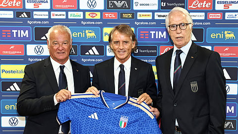 New Italy coach Roberto Mancini (C), technical director Claudio Ranieri (L) and Giovanni Malago, President of the Italian Football Federation pose during the press conference in Rome on Wednesday