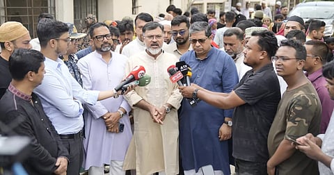 DNCC Administrator Md Safiqul Islam Khan speaks to reporters after visiting the family of conservancy worker Shefali Begum, who was killed in a road accident while on duty, in Dhaka on Friday.
