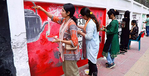 At a programme aimed to restore and repaint the 'July graffiti' art painted on walls during the July Uprising of 2024
