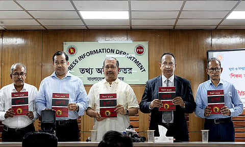 Information and Broadcasting Minister Zahir Uddin Swapon unveils 'Shikol Bhangar July', a commemorative publication brought out by the PID.