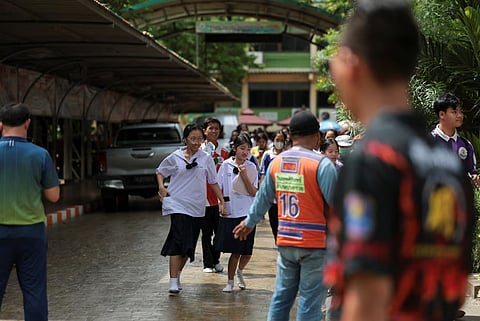 Students run as they evacuate from Debsirin Nonthaburi School, the site of a shooting incident, in Bang Kruai district in Nonthaburi province on the outskirts of Bangkok, Thailand, August 7, 2026. 