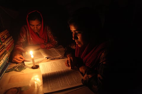 Severe loadshedding forced students to go back to candle light for studying 