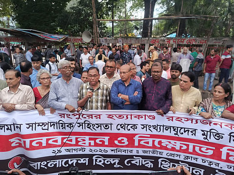 More than 500 people from minority communities joined a human chain and subsequent protest march at the National Press Club in Dhaka 