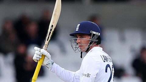 England's Dan Lawrence celebrates after reaching his half century.
