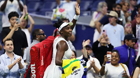 Venus Williams of the US acknowledges the crowd after losing her first round match against Sofia Kenin of the US.