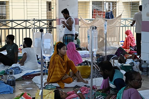 Patients receive treatment at Mugda Medical College Hospital in Dhaka on Monday amid a surge in dengue cases that has strained the hospital’s bed capacity.