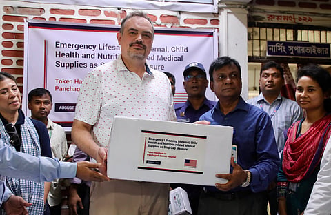 US Ambassador Brent T Christensen presented maternal and newborn care training models to Panchagarh Sadar Hospital Civil Surgeon Dr Mizanur Rahman