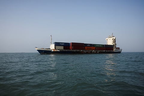 A vessel in the Strait of Hormuz visible near the beach of Bandar Abbas, Iran, August 27, 2026.