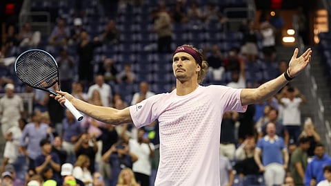 Zverev soaks up pressure to advance, rain plays spoilsport at US Open