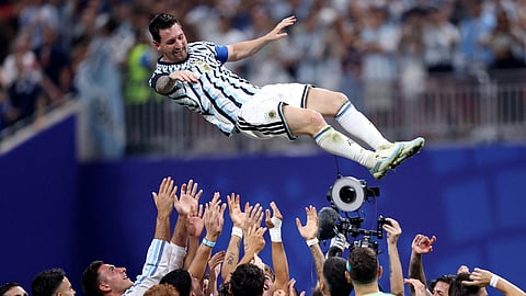 Argentina's Lionel Messi is lifted into the air by teammates after Argentina's 2026 World Cup round-of-16 win over Egypt.
