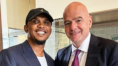 Samuel Eto'o (L) alongside FIFA president Gianni Infantino.