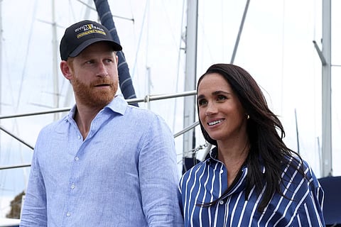 Britain's Prince Harry and Meghan, the Duke and Duchess of Sussex, disembark after sailing on Sydney Harbour with veterans from the Invictus Australia community, in Sydney, Australia, April 17, 2026.
