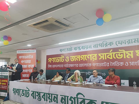 Speakers address a national seminar on the July Charter and referendum implementation at the National Press Club in Dhaka on Saturday.