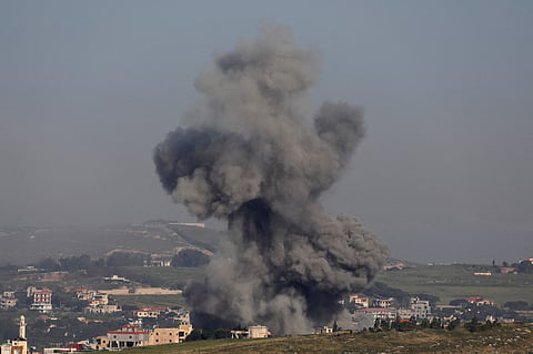 Smoke rises following an Israeli strike in southern Lebanon as seen from Marjayoun, May 11, 2026. 