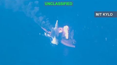 The image shows a US military strike on an Iranian oil tanker, captured from video released by US Central Command. 