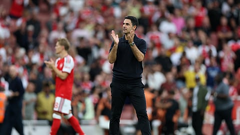 Arsenal manager Mikel Arteta applauds the fans after their Premier League match against Chelsea at Emirates Stadium in London on September 6, 2026.