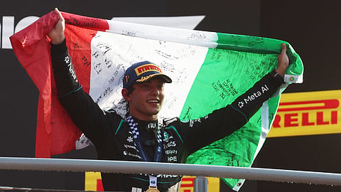 Mercedes’ Andrea Kimi Antonelli celebrates on the podium after winning the Italian Grand Prix at the Autodromo Nazionale Monza in Monza, Italy.