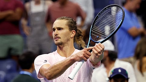Alexander Zverev celebrates after beating Luciano Darderi to reach the US Open quarter-finals.