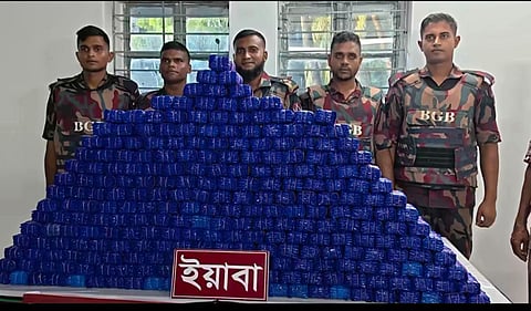 Members of the Border Guard Bangladesh (BGB) display the seized 14 lakh pieces of yaba on September 9, 2026.