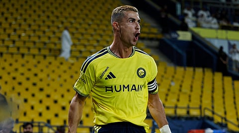 Cristiano Ronaldo celebrates after opening the scoring for Al Nassr against Abha.