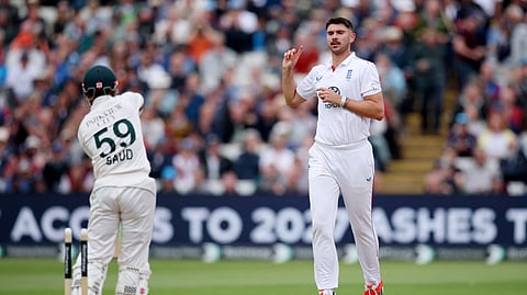 England's Josh Tongue celebrates after taking the wicket of Pakistan's Saud Shakeel.