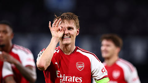 Martin Odegaard celebrates after giving Arsenal the lead against Napoli.