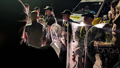 Masked protesters gathered outside a Portsmouth hotel after mistakenly believing Pakistan’s U19 cricket team were asylum seekers.