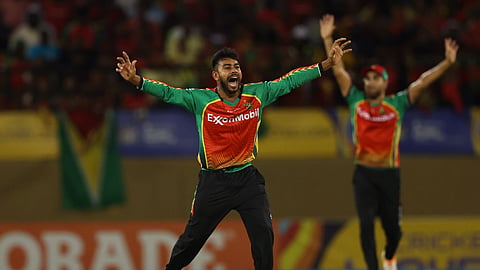 Mehidy Hasan Miraz appeals for a wicket during his first CPL match for Guyana Amazon Warriors.