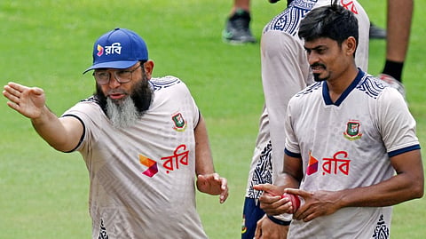 Bangladesh spin bowling coach Mushtaq Ahmed (L) and left arm spinner Taijul Islam.