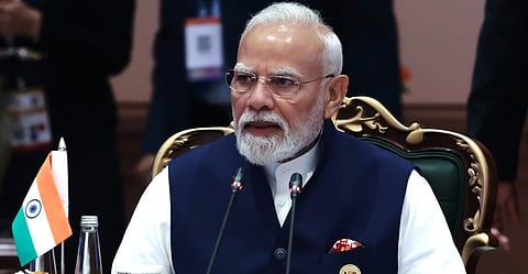 Indian Prime Minister Narendra Modi attends a session of the BRICS Plus Outreach format in New Delhi, India, on Sunday, Sept. 13, 2026. 