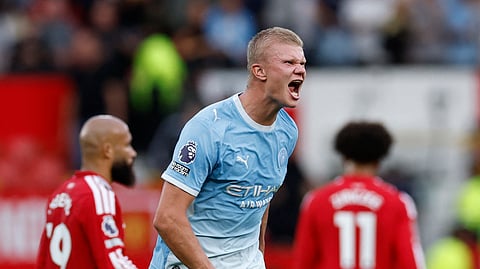 Manchester City's Erling Haaland celebrates after the match.
