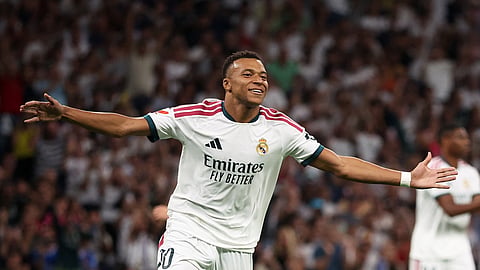 Real Madrid's Kylian Mbappe celebrates scoring their first goal.
