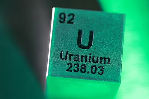 A block with the symbol, atomic number and mass number of Uranium (U) element, in this illustration taken January 21, 2026. 