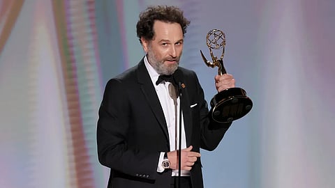 Matthew Rhys with his best comedy actor Emmy for Widow's Bay