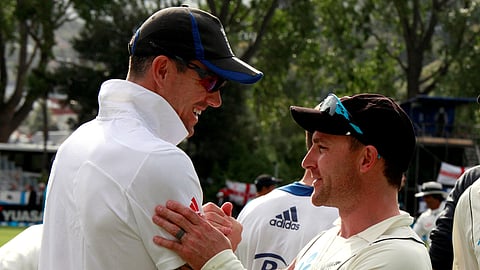 New Zealand's captain Brendon McCullum (R) shakes hands with England's Kevin Pietersen as they walk off the ground at the end of the first test at the University Oval in Dunedin March 10, 2013. 