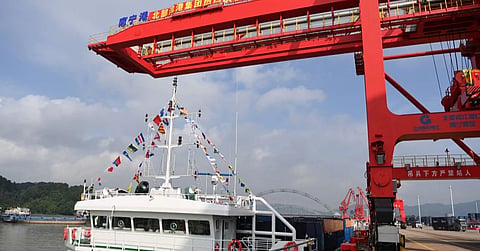 A decorated cargo vessel at Nanning Port in Guangxi, China, preparing to navigate the newly opened Pinglu Canal on September 16, 2026.