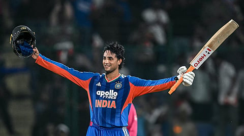 India's Abhishek Sharma celebrates after scoring a century during the third T20 international cricket match between India and Afghanistan.