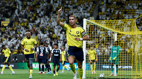 Al Nassr's Cristiano Ronaldo celebrates scoring their first goal.